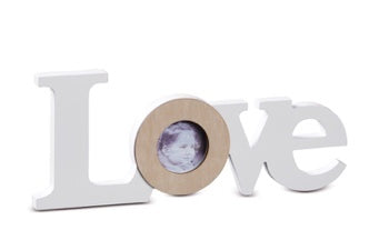 Love written in wood with photo frame
