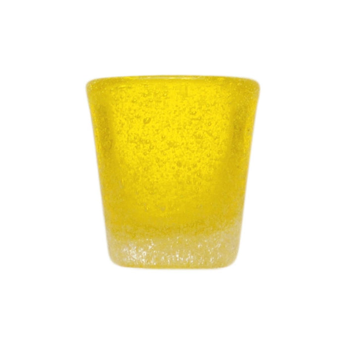 Bitter little glass in transparent yellow glass